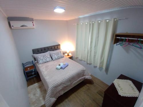 CASA OTTON - Casa aconchegante, 3 quartos com cama de casal todos com ar condicionado客房内的一张或多张床位