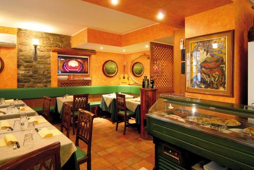 Locanda Barchetta - Room Rental餐厅或其他用餐的地方