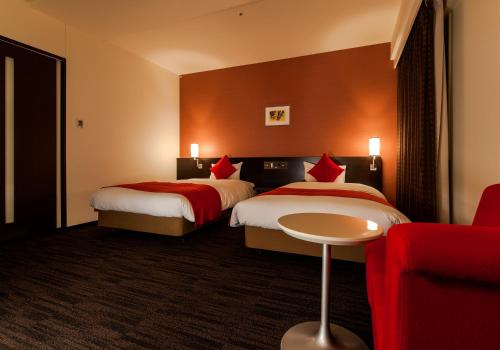 达维奥雅玛艾克玛酒店客房内的一张或多张床位