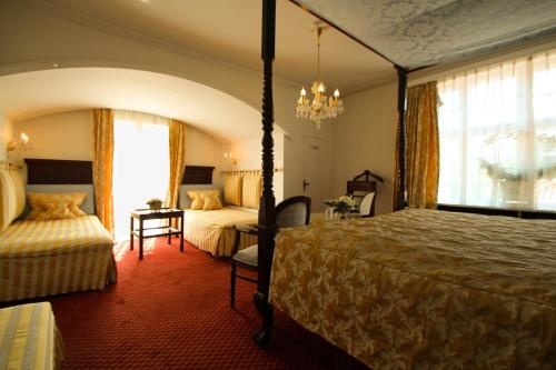 桑特哈斯城堡酒店客房内的一张或多张床位