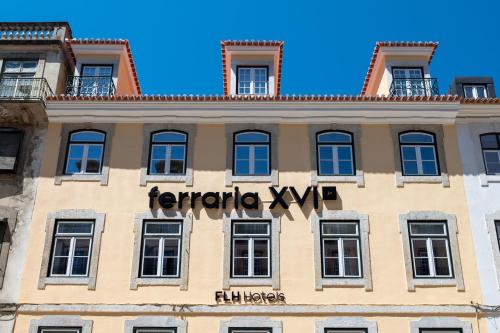 里斯本Ferraria XVI FLH Hotels Lisboa的上面写着费雷罗xwb字的建筑