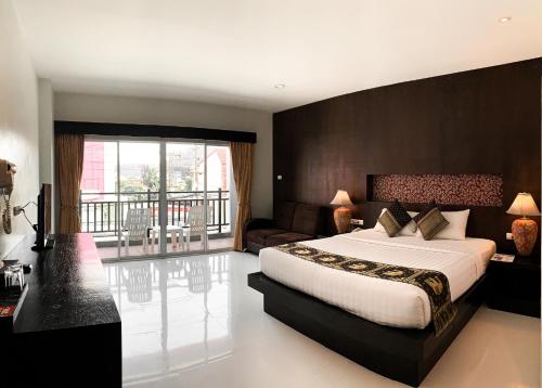 Amata Patong客房内的一张或多张床位