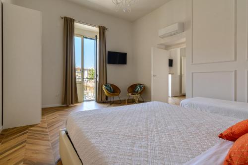 agropoli luxury home客房内的一张或多张床位