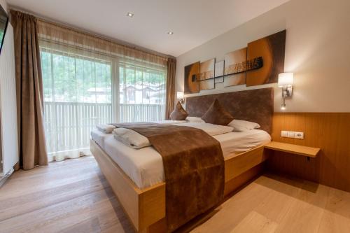 Lapis Monti - Apartments & Suites客房内的一张或多张床位