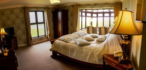 巴里诺尔拉坎城堡田园酒店客房内的一张或多张床位