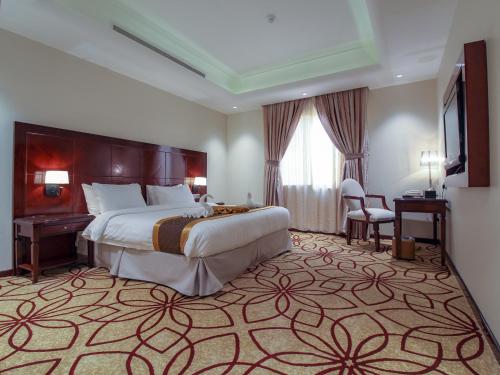 Lotaz Hotel - Al Shatea客房内的一张或多张床位