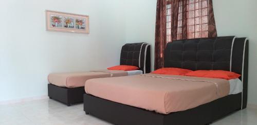 巴西富地Faris's Homestay & Resort的两张床位 - 带两张西德西德西德西德床