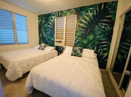 Tropical Getaway客房内的一张或多张床位