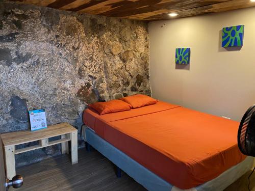Captain Morgan Hostel Lake Coatepeque客房内的一张或多张床位