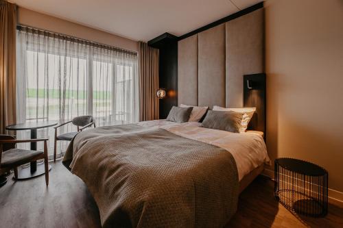 Residence Oude Haven room with terrace客房内的一张或多张床位