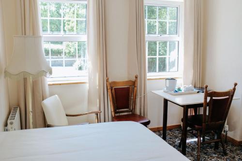 格林山住宿加早餐旅馆客房内的一张或多张床位