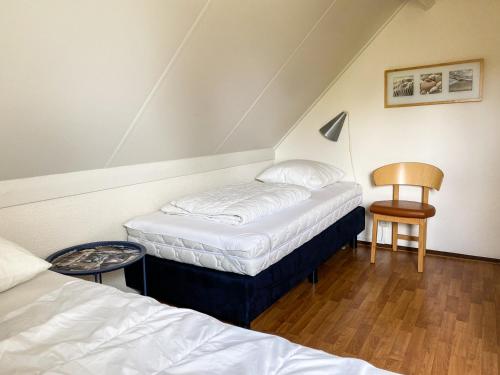 Hello Zeeland - Vakantiehuis Zwin 182客房内的一张或多张床位