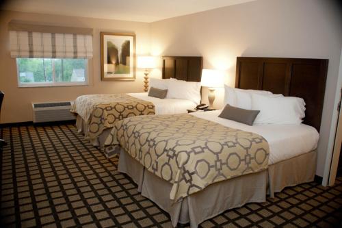 贝利蒙特套房酒店客房内的一张或多张床位