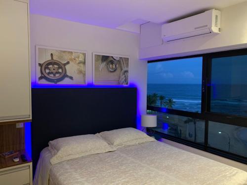 Maravilhoso apartamento 2 quartos vista mar no Ondina Apart客房内的一张或多张床位