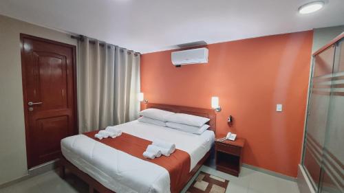 Ensenada Hotel客房内的一张或多张床位