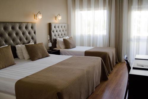 派瓦酒店客房内的一张或多张床位