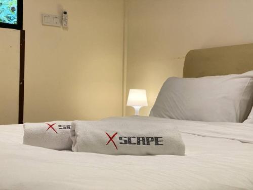 Xscape Tambun客房内的一张或多张床位