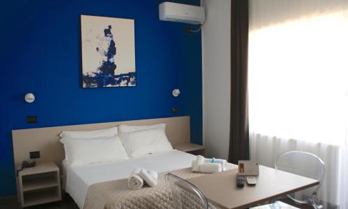 Hotel Palazzo Caveja客房内的一张或多张床位