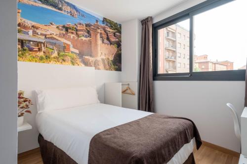 Hotel BESTPRICE Girona客房内的一张或多张床位