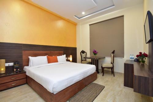 Hotel Bhaskar客房内的一张或多张床位