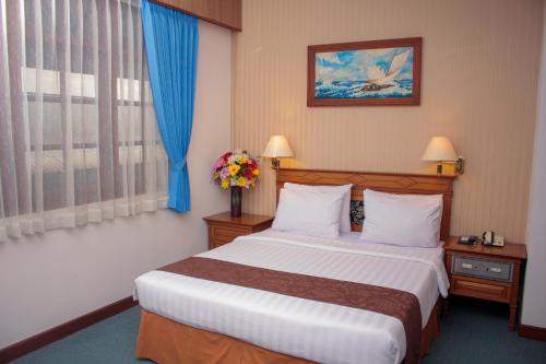 Sapta Nawa Resort 1 Gresik客房内的一张或多张床位