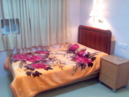 东方明珠旅馆客房内的一张或多张床位