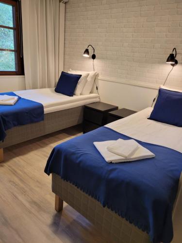 Hotelli Salpakangas客房内的一张或多张床位