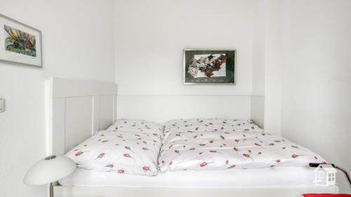 Hamburg Niendorf-Suite客房内的一张或多张床位