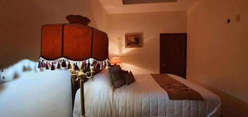 Hotel Mina Vetagrande客房内的一张或多张床位