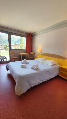 Village vacances de Val d'Isère客房内的一张或多张床位