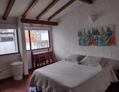 Casa Turística Camitas Inn客房内的一张或多张床位