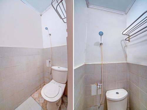 棉兰OYO 90355 Darussalam Inn的一间带卫生间和淋浴的浴室