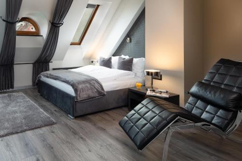 Aparthotel New Lux客房内的一张或多张床位