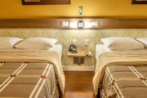 布卢梅诺10号酒店客房内的一张或多张床位