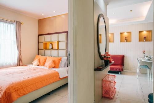 拉瓦林套房公寓酒店客房内的一张或多张床位