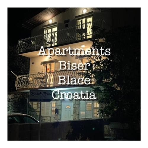 布拉采Apartments BISER的一座建筑,上面标有比烧焦的圆环大公寓的书签