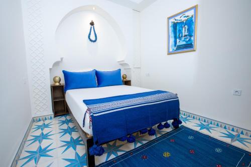 Riad La Vie客房内的一张或多张床位