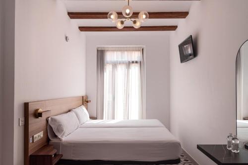 Hotel 19-30 Valencia客房内的一张或多张床位