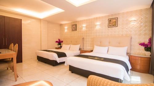 Suwara Hotel Kepong KL客房内的一张或多张床位