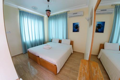 红海潜水中心酒店客房内的一张或多张床位