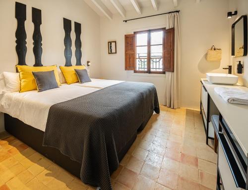 Unic - Turisme d'interior客房内的一张或多张床位