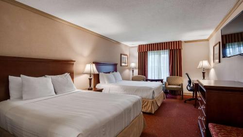 莫里斯敦贝斯特韦斯特优质酒店客房内的一张或多张床位