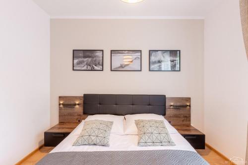 Apartament Solna 208 Kołobrzeg客房内的一张或多张床位