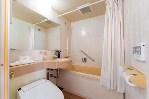 小山宫经济型酒店的一间浴室