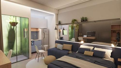 圣保罗JK Luxury Stay的一间卧室配有蓝色的床和沙发