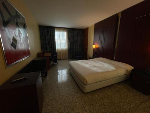 Hotel Amaltea by Executive Sport客房内的一张或多张床位