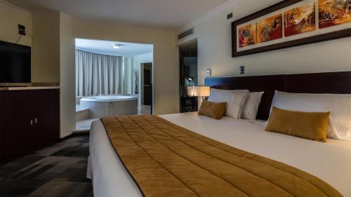 Hotel Costa Pacifico - Suite客房内的一张或多张床位