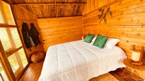Tropical House客房内的一张或多张床位