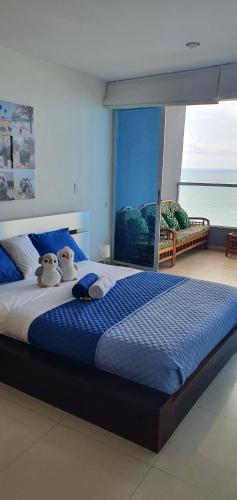 Departamento Frente al Mar Diamond Beach客房内的一张或多张床位