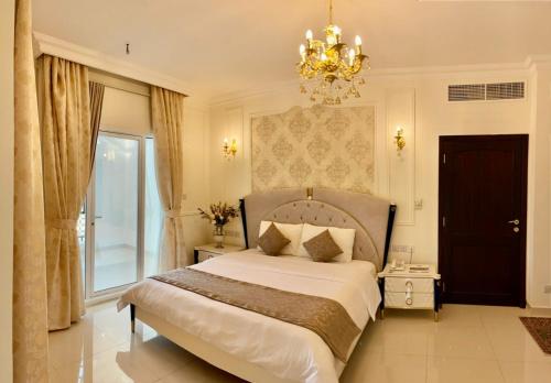 A'Sinamar Hotel Apartment客房内的一张或多张床位